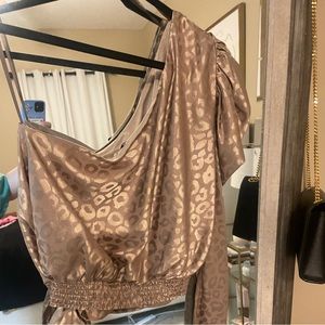 One shoulder DO+BE top. Brown cheetah ties on the side.